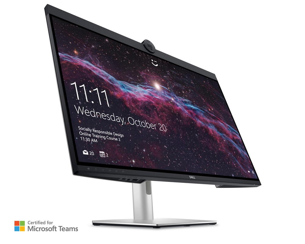 Picture of a Dell UltraSharp U3223QZ Monitor with a colorful background and time and date on the screen.