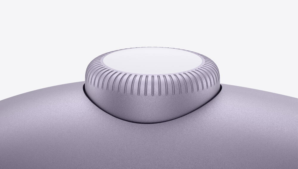 Un prim-plan al coroanei digitale AirPods Max pe violet.